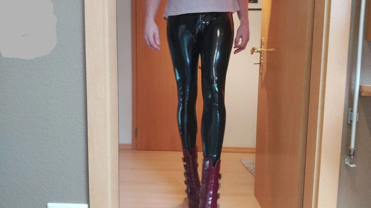 Crossdresser teasing in shiny Leggings and Heels