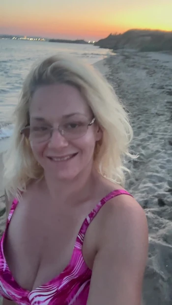 Walking at the beach on the sunset
