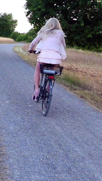 Jaw-dropping moment from "Posed & Wanked In Public - most exciting is biking in short clothes and shiny nylon stockings"