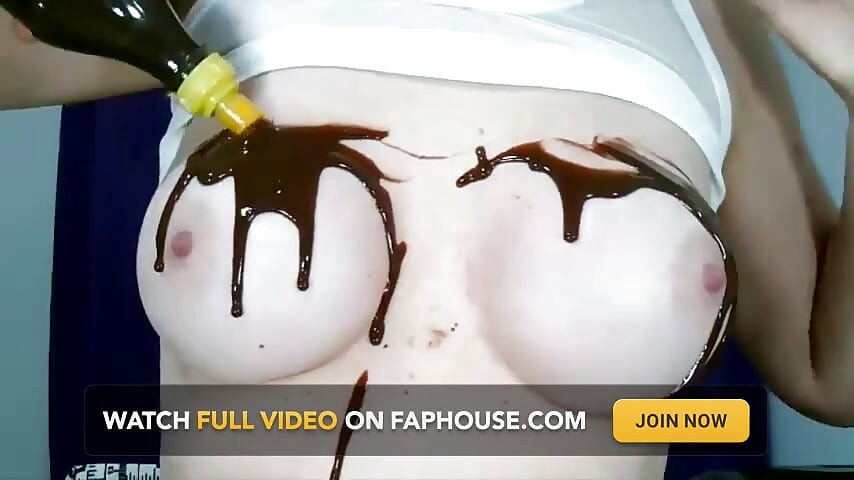 Wetting boobs, tities and nipples with chocolate
