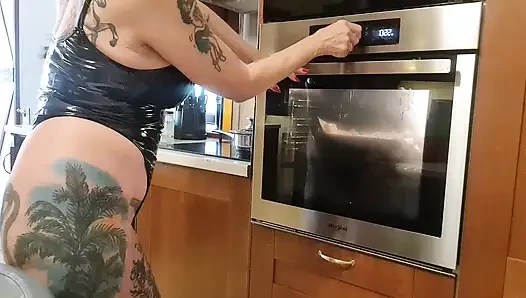 Melissa Johnson in latex, baking