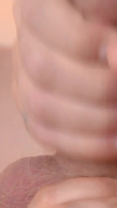A Girl rubs against a guy's balls, sniffs them, and takes his cum in her mouth | Clip 2