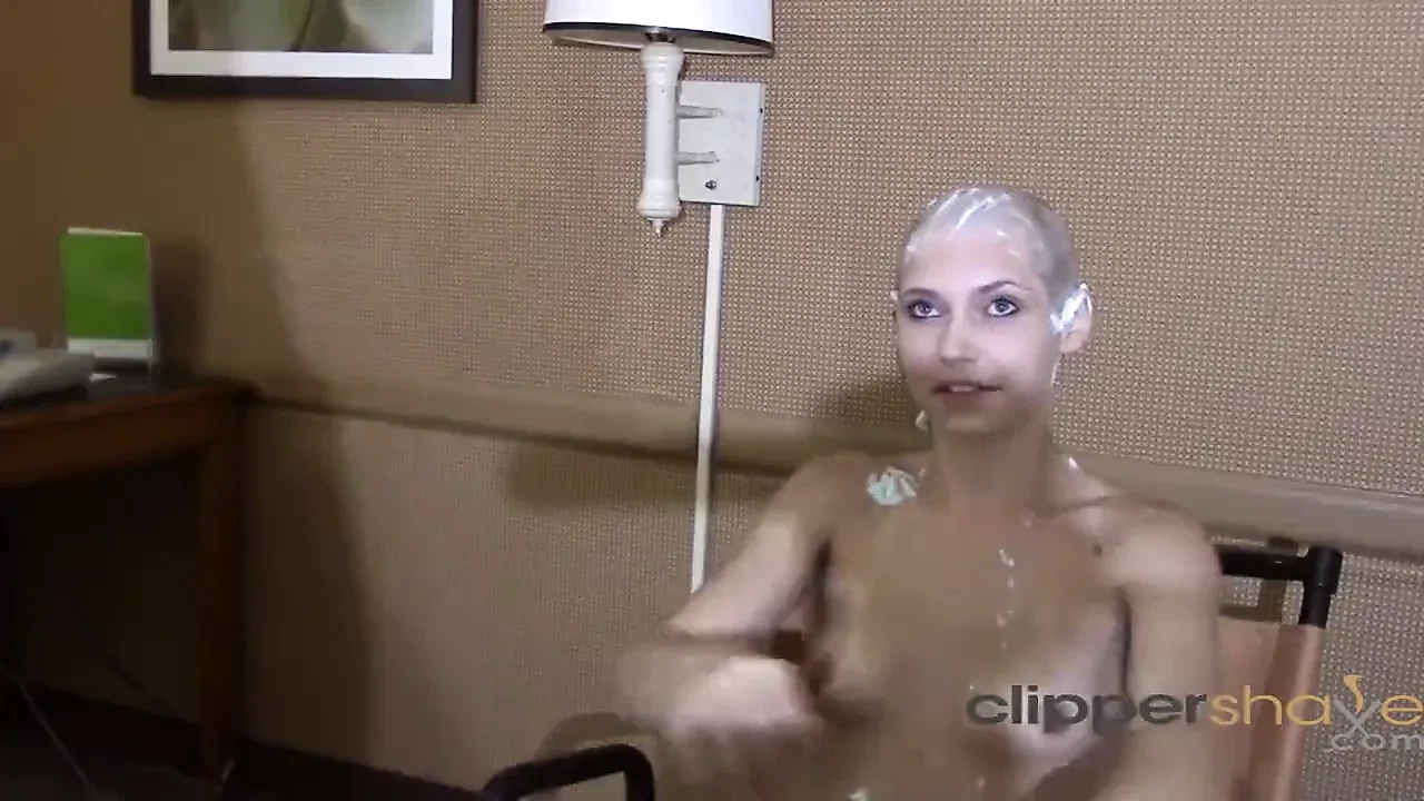 Blonde girl gets head shaved