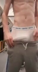 Teasing Twink wanks in his shorts
