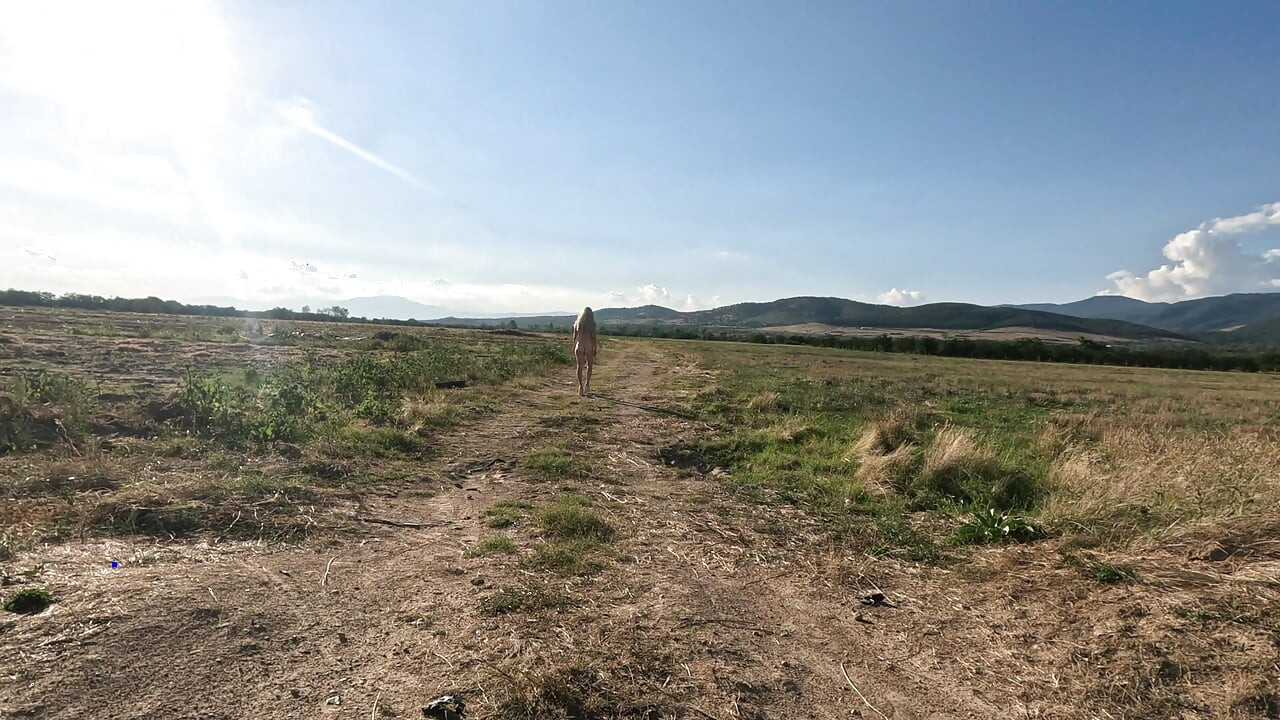 Slave Tih Ie Walks in the Blue Dress