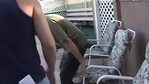 Blonde blows two men while getting penetrated from behind on a zebra couch