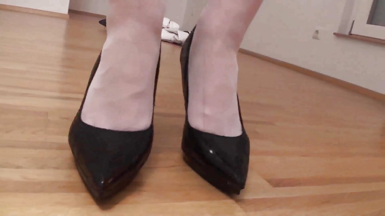 Busty blonde MILF tries out some shoes