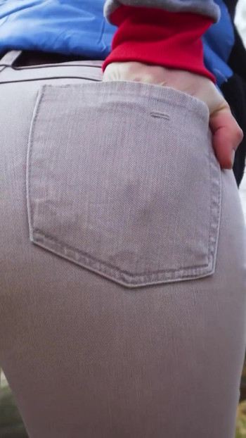 Stunning moment from "Real Amateur In Tight Pants Showing Off Her Visible Panty Line Ass Outdoor"