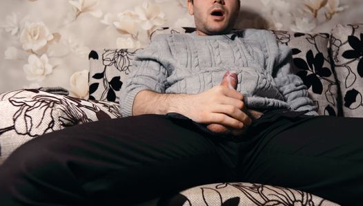 The guy watches porn and masturbates. Ruined orgasm 4 times and loud moans during a cumshot. 4K