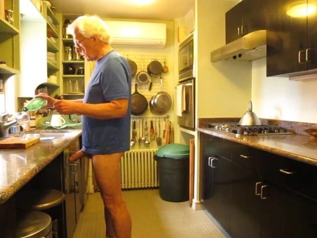 In the kitchen with an erection