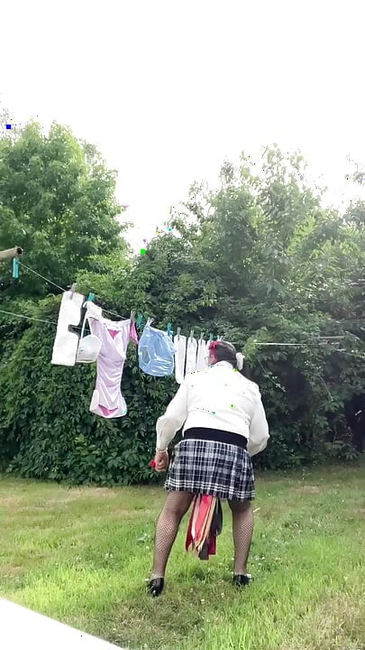 In an outfit with a new blouse on which I've modified the ascot tie to hang my laundry.