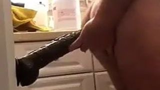 Step Dad plays with a BBC dildo