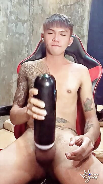 Pinoy Horny Inked Twink Playing with His Masturbator Toy