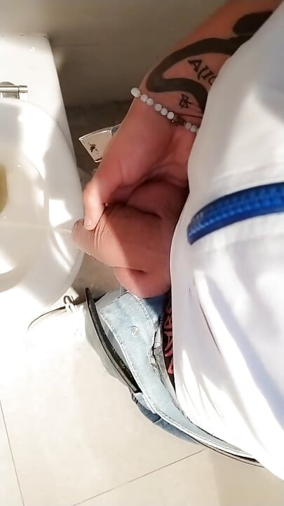 Twink with Fat Uncut Cock Piss at a Rest Stop Toilet