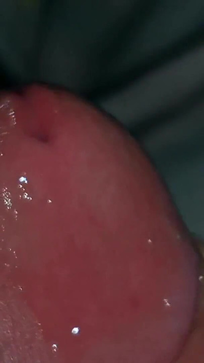 Captivating moment from "Very close-up of an over-excited penis and streams of pre-cum!"