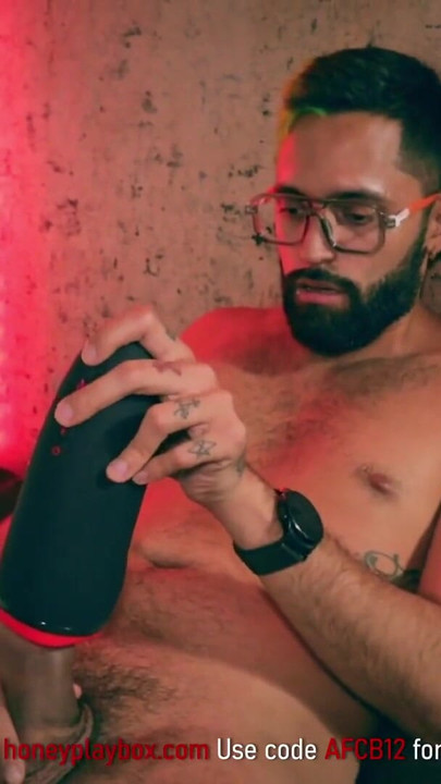 Stunning moment from "Big Cock Latino Camilo Brown Testing Honeyplaybox Dayo Vibrating, Heating and Clamping Masturbator"