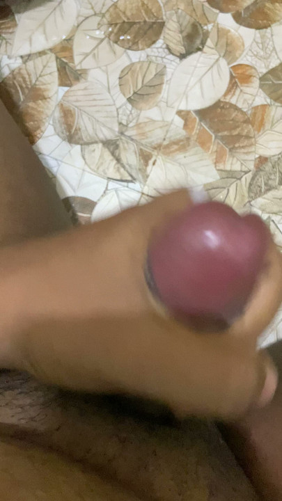 a close up cum shot of a young male