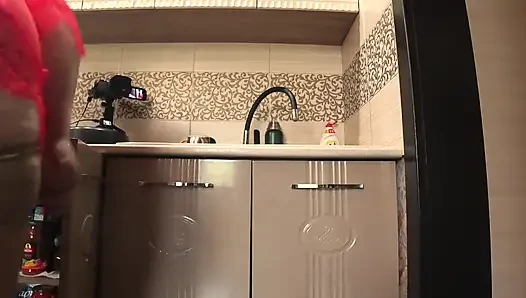 A Big Ass Under a Short Robe Close-up. My Mature Wife in the Kitchen.