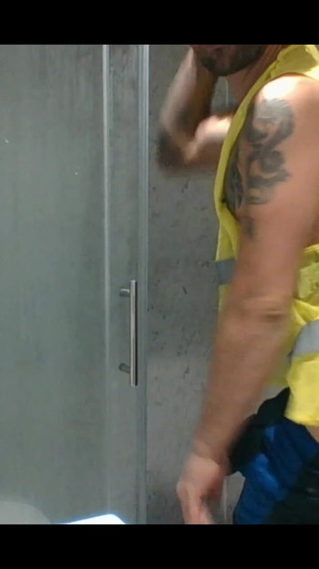 Stunning moment from "Carl working in his filthy hi vis workwear give us a  nice cum shot in the shower"