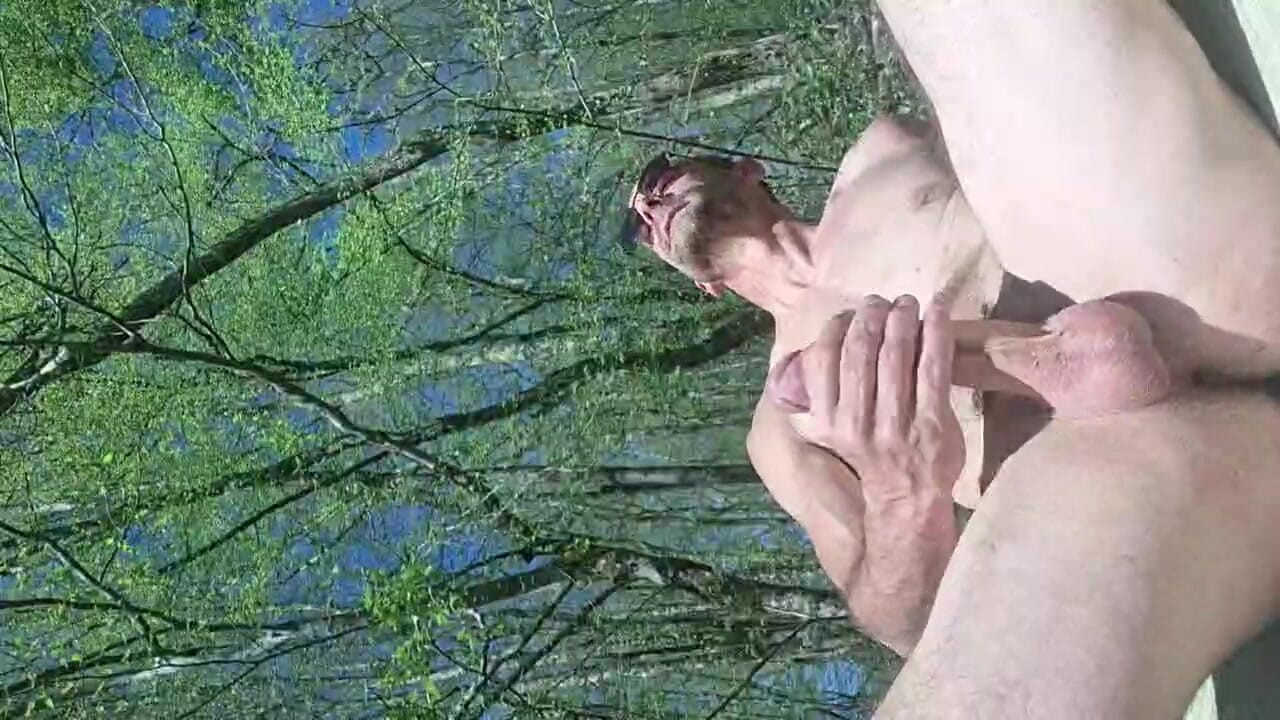 Naked in the middle of the forest