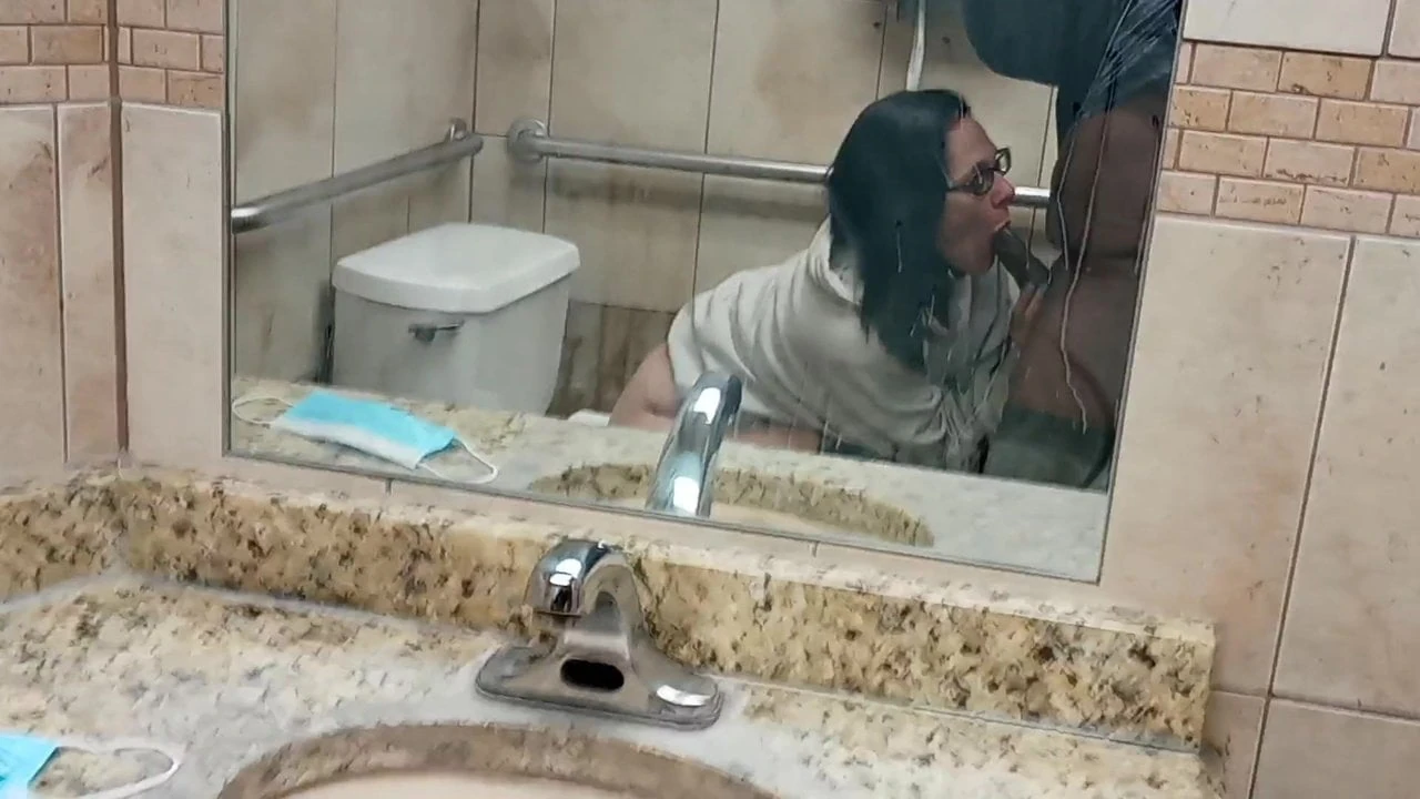 Public bathroom blowjob