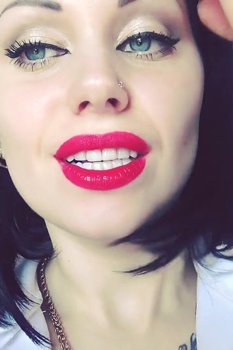Luscious red lips tease