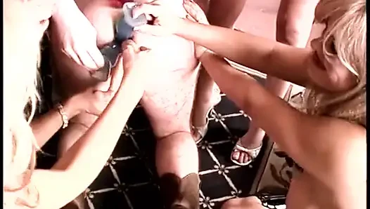Bombshell MILFS pound their slave with a strap-on