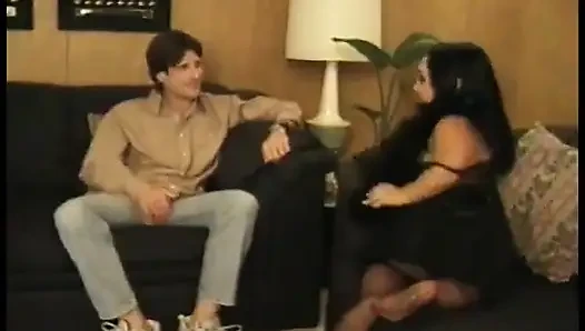Slutty chick in mesh gets ass fingered and fucked on couch