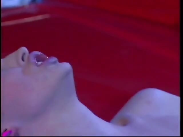 Horny brunette on her knees sucks on a big white cock