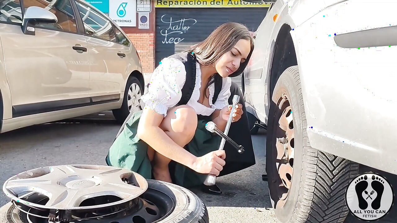 Dirndl Slut Gets Dirty and Oily Changing Tires