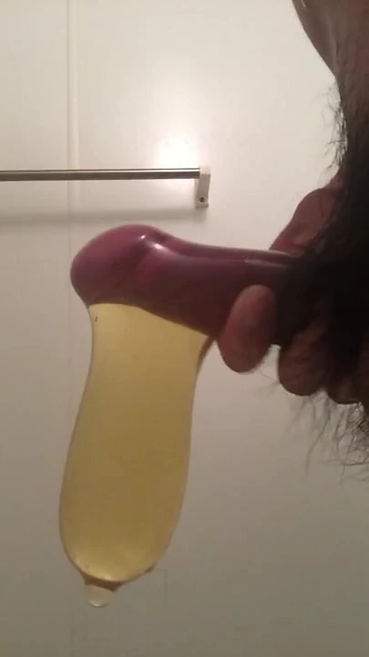 Piss and cum in condom