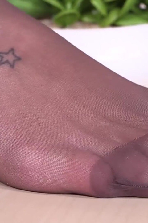 Adorable police officer Daniela exposing her sexy feet
