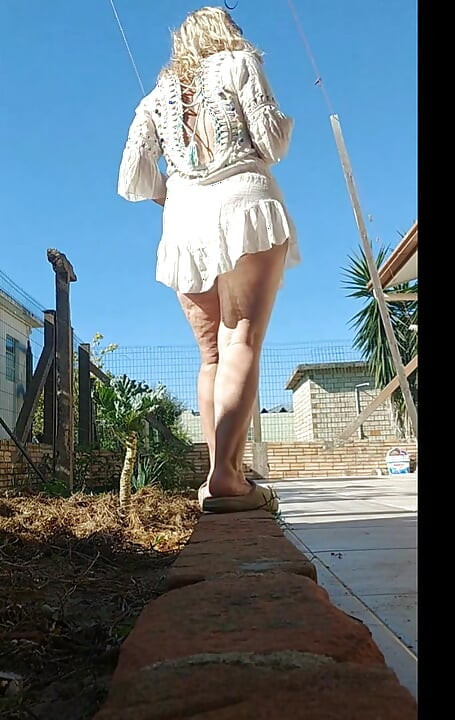 My stepmom showing off in public in the Garden without panties.