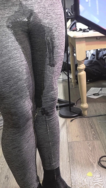 Gray leggings wetting leaves me standing in puddle
