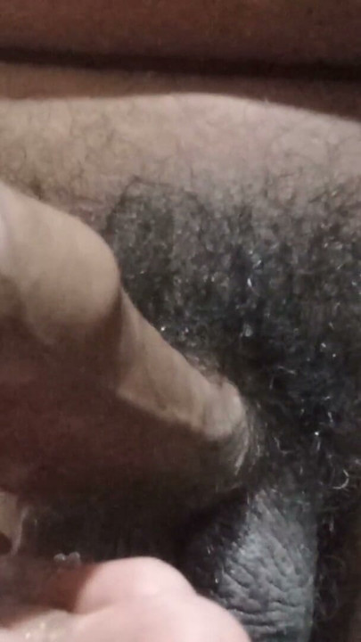 A young man is jerking his penis and releasing semen. He is doing it and is in pain. | Clip 1