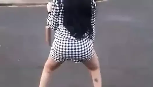 shemale dancing in the middle of the street