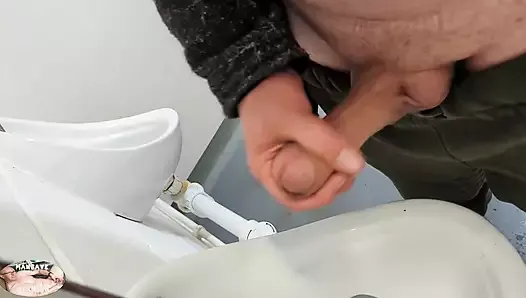 Public urinal masturbation