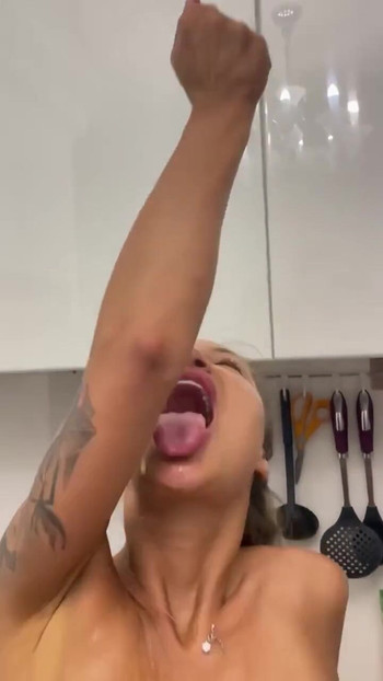 Jaw-dropping moment from "Naked Monika Fox Makes Orange Juice & Squeezes Juice On Herself"
