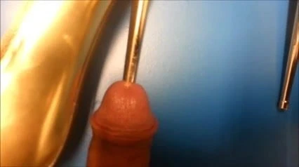 gold high heel inside cock and cum shot