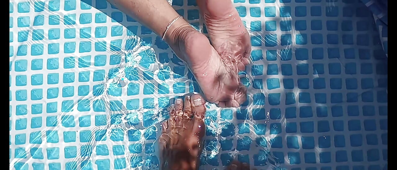 Cleaning the pool while barefoot