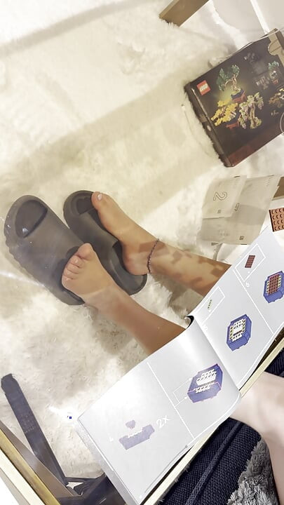 My Feet on Display While I Build Lego