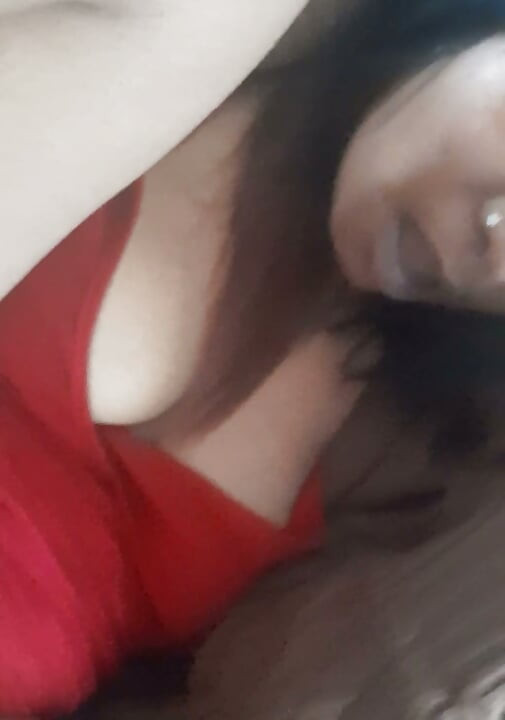 Busty Indian MILF gets fucked in red dress on the couch