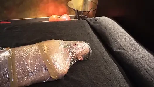 Femdom girl puts her slave in tape bondage
