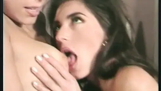 Lesbo babes lick each others cunts then fuck with  a huge dildo