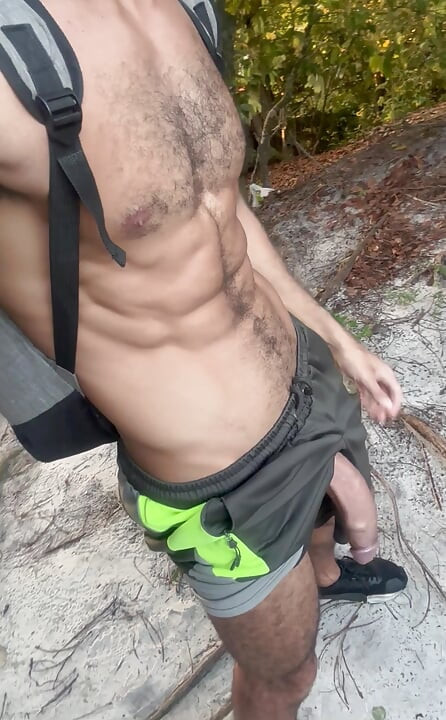 Hairy dad with a huge dick showing off on the trail