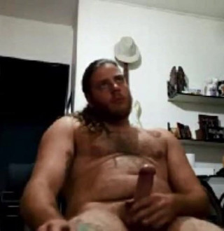 Tattooed beefcake with fat cock