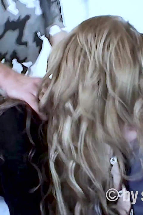 Tina with the Lion's Mane Swallows Her Tail