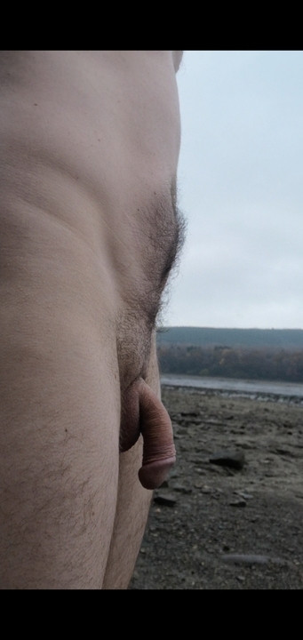 Morning walk naked by a lake