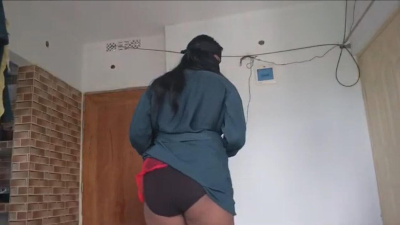 Shy muslim girl taking off burqa slowly