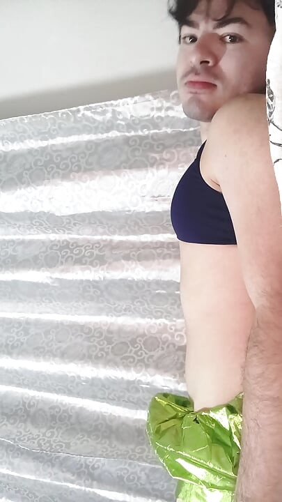 gay femboy sexy skirt lingerie and licking lollipop